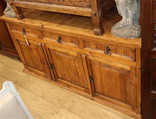 An olive wood dresser, fitted three drawers over panelled cupboards, W.168cm